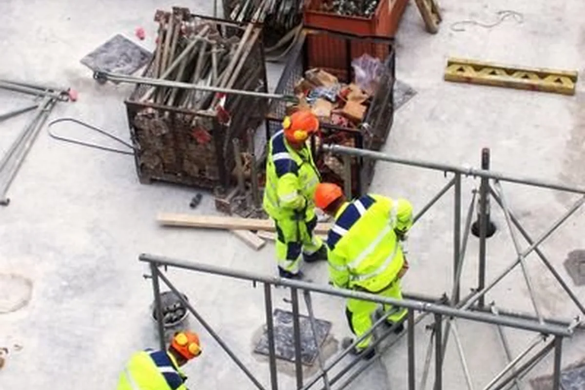 Construction crew reviewing project work for Koka Brothers Construction LLC